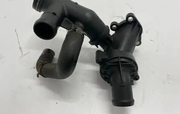Thermostat/thermostat housing