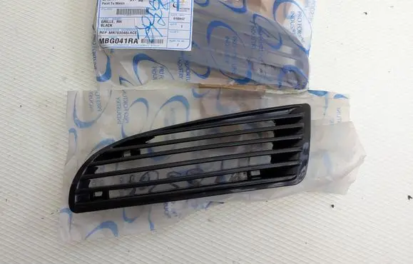 Mitsubishi Galant Front fog light trim/grill MBG041BA MR763046LACE