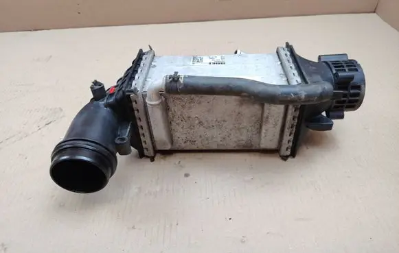 Volkswagen Golf VII Intercooler radiator 04E145785