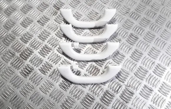 Volkswagen PASSAT B7 A set of handles for the ceiling 1K0857607N 1K0857607M