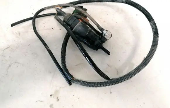 Renault Megane I Windscreen/windshield washer pump 7700821782
