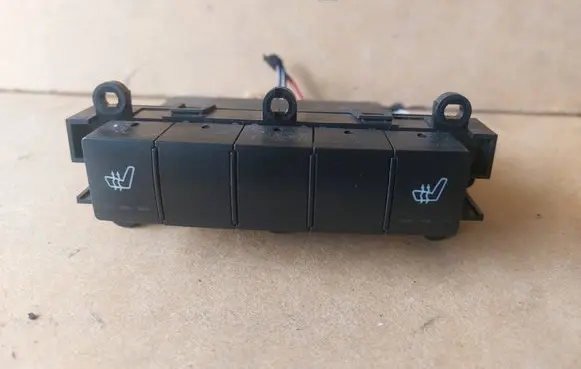 Seat heating switch