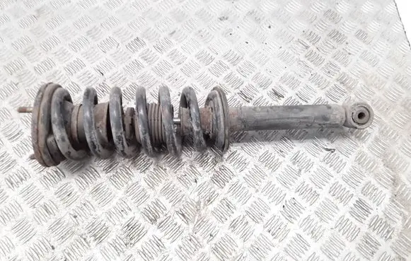 Mitsubishi Pajero Front shock absorber with coil spring MR554292