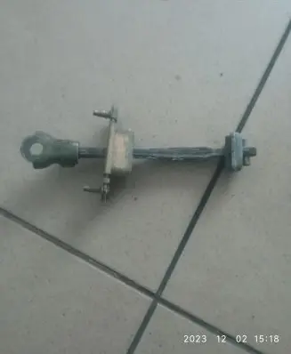 Subaru Legacy Rear door check strap stopper