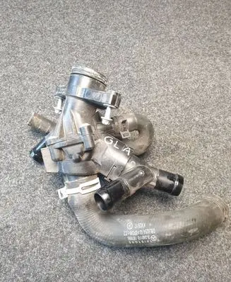 Thermostat/thermostat housing