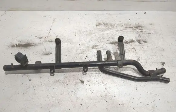 Volkswagen Touareg I Coolant pipe/hose 121065C DE7L6