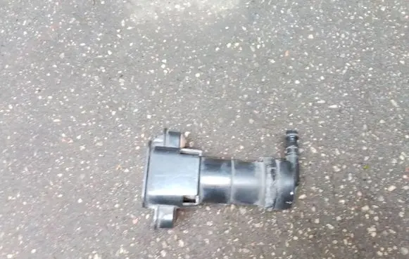 Headlight washer spray nozzle