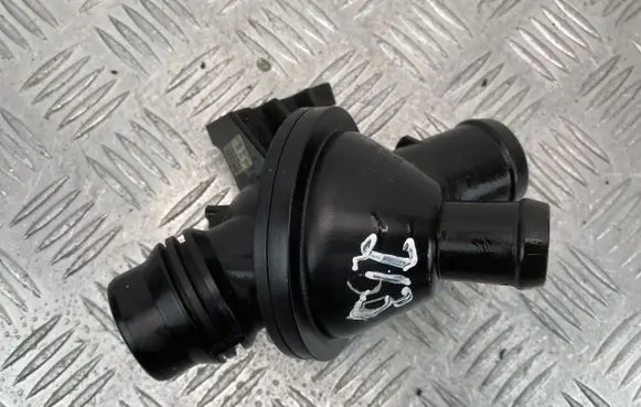 Thermostat/thermostat housing