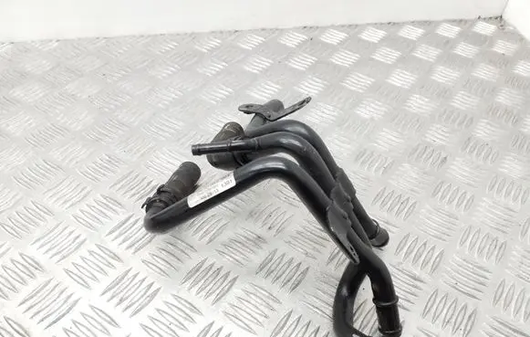 Skoda Octavia Mk3 (5E) Engine coolant pipe/hose 04L121064G