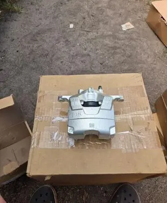 Opel Astra J Front brake caliper 95522602