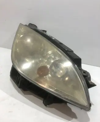 Mitsubishi Colt Headlight/headlamp MR957354 0301208202
