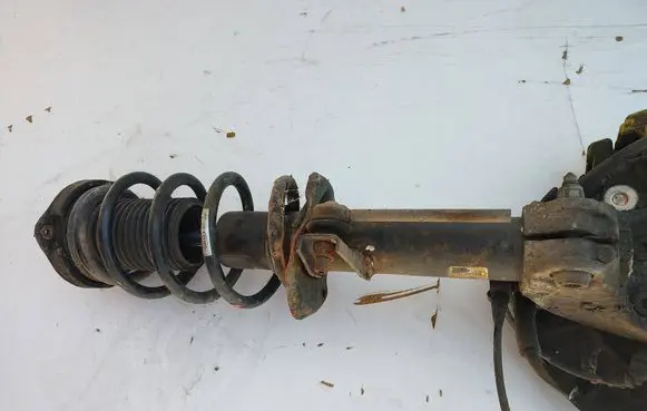 Volkswagen PASSAT CC Front shock absorber with coil spring 