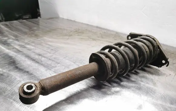 Nissan Primera Rear shock absorber with coil spring 