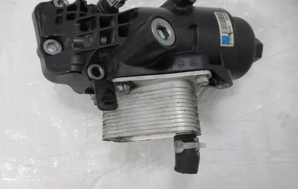 KIA Ceed Oil filter mounting bracket 264102A300