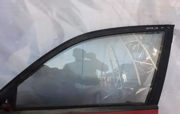 Mazda 626 Front door window glass four-door