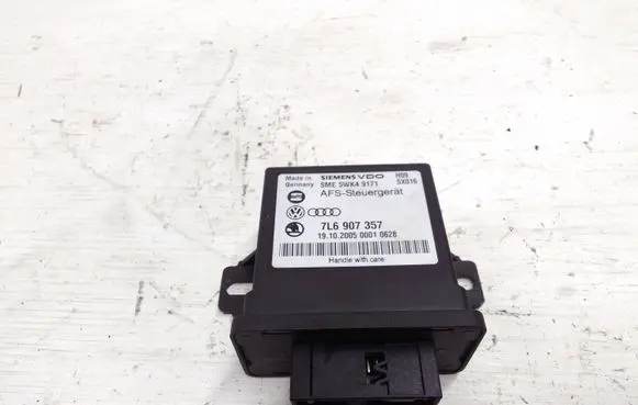 Volkswagen Touareg I Light module LCM 7L6907357