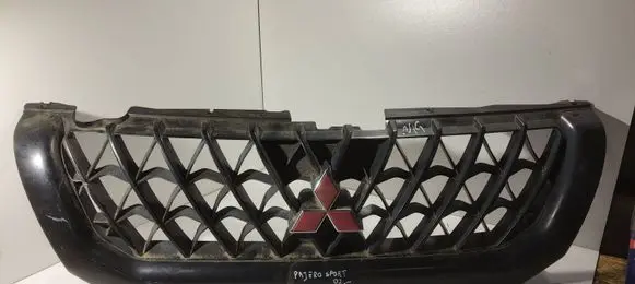 Mitsubishi Pajero Sport I Front bumper upper radiator grill MR478595