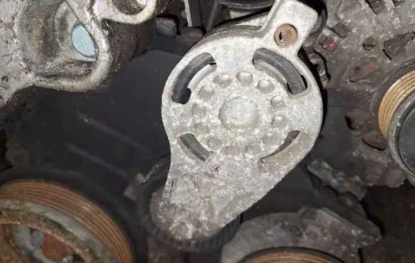 Generator/alternator belt tensioner