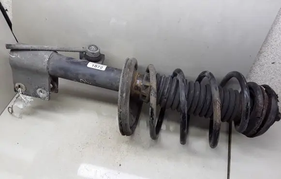 Citroen C4 I Front shock absorber with coil spring