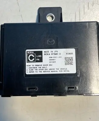Mazda 3 Door control unit/module BCKA675M0 GGMZ001J04 0989D1