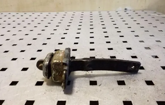 Front door check strap stopper