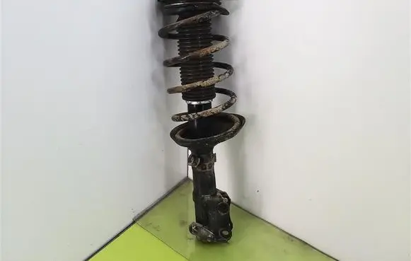 Volkswagen Polo Front shock absorber with coil spring 