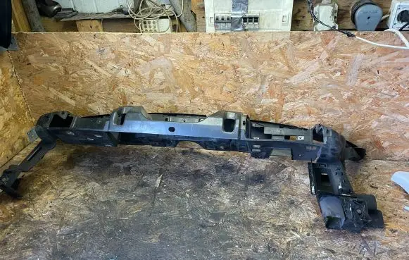 Top upper radiator support slam panel