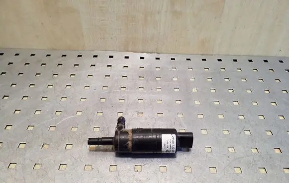 Volkswagen Golf IV Headlight washer pump 1J0955681