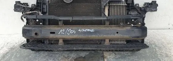 Radiator support slam panel
