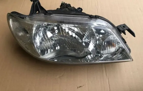Mazda 323 F Headlight/headlamp