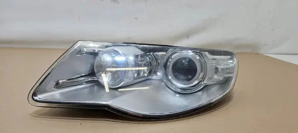 Volkswagen Touareg I Headlight/headlamp 7L6941031C