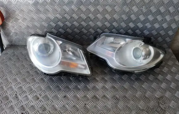 Volkswagen Touran I Headlights/headlamps set 0301233202 0301233201 1T1941006B