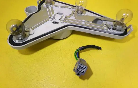Ford Focus Tail light bulb cover holder 0374D XS4X13N005CA