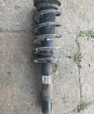Volkswagen Touran I Front shock absorber with coil spring 1t041303fbq
