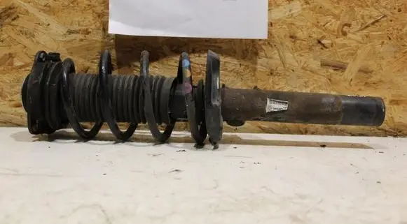 Volkswagen Jetta VI Front shock absorber with coil spring 1T0413031DH