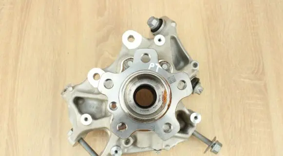 Rear wheel hub spindle/knuckle