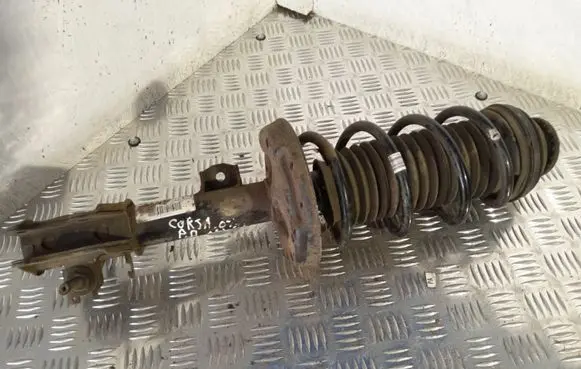 Opel Corsa D Front shock absorber with coil spring 13214354 GP27381