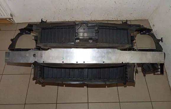 Radiator support slam panel