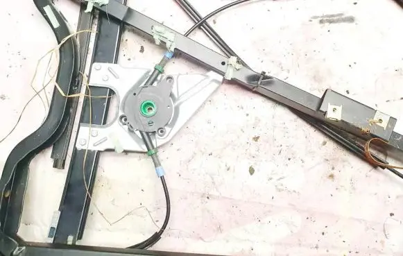 Sliding door window regulator with motor