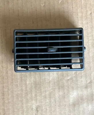Volkswagen Golf IV Dash center air vent grill 1J0819719B
