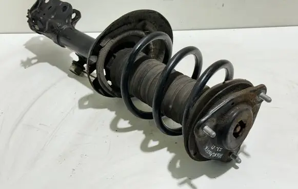 Toyota Highlander XU70 Front shock absorber with coil spring 485100E370
