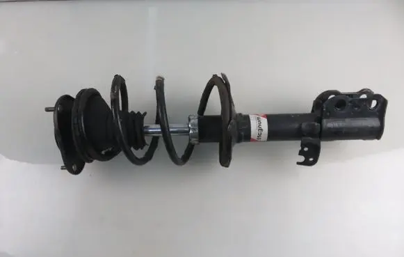 Toyota Corolla Verso E121 Front shock absorber with coil spring 
