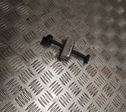 Front door check strap stopper