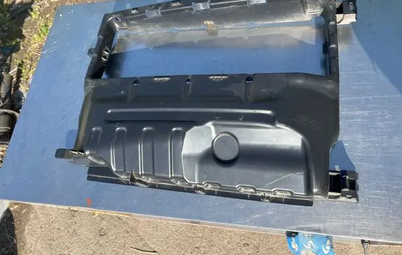 Radiator support slam panel