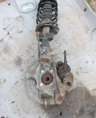 Front wheel hub spindle knuckle