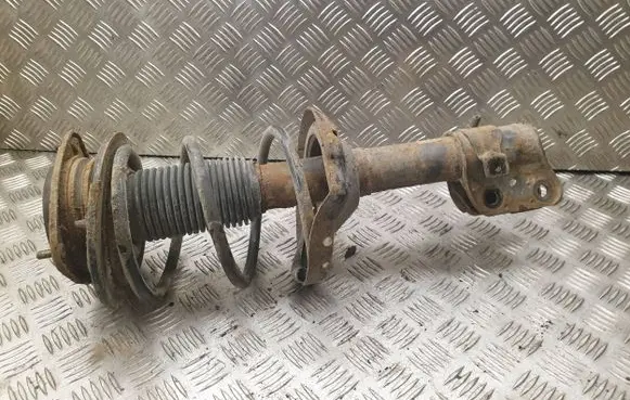 Subaru Legacy Front shock absorber with coil spring