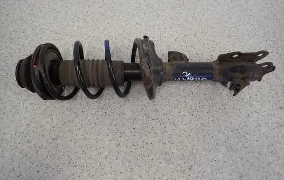 Suzuki Celerio Front shock absorber with coil spring