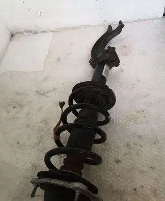 Audi A6 C7 Front shock absorber with coil spring 4G0031