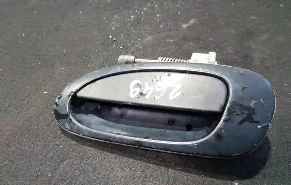 Mazda 323 Front door exterior handle