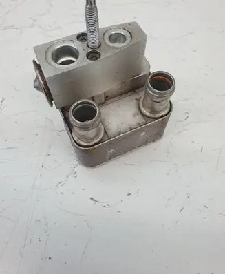 Oil filter mounting bracket